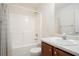 Bathroom with a bathtub, toilet, and sink with vanity and mirrored medicine cabinet at 40 Browning Dr, Covington, GA 30016