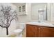 Bathroom with a decorative shower curtain, vanity, and mirror, creating a functional and stylish space at 40 Browning Dr, Covington, GA 30016