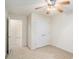 Bedroom features a ceiling fan and a double-door closet, providing comfort and ample storage space at 40 Browning Dr, Covington, GA 30016