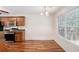 Bright kitchen and dining area with stainless steel appliances and hardwood floors at 40 Browning Dr, Covington, GA 30016