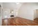 Cozy living room with hardwood floors, fireplace, and ample natural light at 40 Browning Dr, Covington, GA 30016