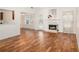 Inviting living room features hardwood floors, fireplace, and a sunny window at 40 Browning Dr, Covington, GA 30016