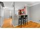 Kitchen with stainless steel appliances, granite countertops, and bar seating at 406 Heritage Park Nw Trce # 22, Kennesaw, GA 30144