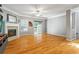 Spacious living room features hardwood floors, fireplace, and natural light from sliding door at 406 Heritage Park Nw Trce # 22, Kennesaw, GA 30144