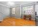 Office area with natural light, hardwood floors, and neutral wall color at 406 Heritage Park Nw Trce # 22, Kennesaw, GA 30144
