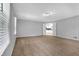 Spacious living room with an entrance to the kitchen in the background at 1724 Rhonda Ln, Stone Mountain, GA 30087