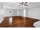 Open living room featuring hardwood floors and neutral gray paint at 1724 Rhonda Ln, Stone Mountain, GA 30087