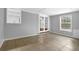 Open living space with tiled floors and French doors at 1724 Rhonda Ln, Stone Mountain, GA 30087