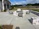 Inviting outdoor fire pit with seating, perfect for gathering and enjoying cozy evenings at 513 Godfrey Dr, Cumming, GA 30040