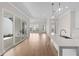 Bright living room with floor to ceiling glass doors and modern finishes, seamlessly blending indoor and outdoor spaces at 513 Godfrey Dr, Cumming, GA 30040