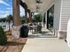 Elegant outdoor seating area with ceiling fans, ideal for relaxing or entertaining by the community pool at 513 Godfrey Dr, Cumming, GA 30040