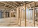 Unfinished basement with exposed beams, plumbing, and potential for customization at 2806 Hedgewood Nw Dr, Atlanta, GA 30311