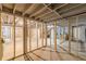 Spacious unfinished basement with exposed ceiling, concrete floors, and ample room for design at 2806 Hedgewood Nw Dr, Atlanta, GA 30311