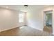 Bright bedroom featuring wood-look floors and a window for ample natural light at 2806 Hedgewood Nw Dr, Atlanta, GA 30311