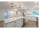 Lovely kitchen with quartz countertops, white cabinets and stainless steel appliances at 2806 Hedgewood Nw Dr, Atlanta, GA 30311