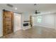 Spacious living room with wood floors, barn doors, and a fireplace at 2806 Hedgewood Nw Dr, Atlanta, GA 30311