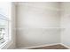 Walk-in closet with adjustable wire shelving and laminate flooring provides organized storage at 3657 Atherton Park Ct, Suwanee, GA 30024