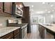 Gourmet kitchen featuring stainless steel appliances and granite countertops at 3657 Atherton Park Ct, Suwanee, GA 30024
