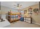 Bright and cheerful ' bedroom with a bunk bed, playful decor, and ample storage space at 610 Syemore Pass, Canton, GA 30115