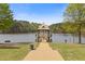 Lakeside gazebo with access walkway offering scenic views at 610 Syemore Pass, Canton, GA 30115