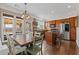 This bright eat-in kitchen has stainless appliances and hardwood floors, perfect for Gathering gatherings at 610 Syemore Pass, Canton, GA 30115