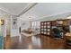 Bright living room with hardwood floors, neutral colors, and natural light at 610 Syemore Pass, Canton, GA 30115