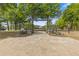 Landscaped park entrance path with stone pavers and wooden pergola at 610 Syemore Pass, Canton, GA 30115