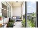 Inviting balcony space with a comfortable seating area and views of the surrounding neighborhood at 625 Piedmont Ne Ave # 3029, Atlanta, GA 30308