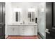 Modern bathroom with double vanity, sleek fixtures, and a spacious glass-enclosed shower at 625 Piedmont Ne Ave # 3029, Atlanta, GA 30308