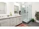 Elegant bathroom featuring a double vanity, modern shower, and stylish fixtures at 625 Piedmont Ne Ave # 3029, Atlanta, GA 30308