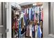 Organized closet with shelving, hanging rods, and ample storage space for clothes and accessories at 625 Piedmont Ne Ave # 3029, Atlanta, GA 30308
