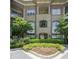 Beautifully landscaped condo building featuring brick and stone accents at 625 Piedmont Ne Ave # 3029, Atlanta, GA 30308