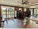Spacious gym with free weights, bench, mirror, and open windows at 625 Piedmont Ne Ave # 3029, Atlanta, GA 30308