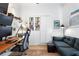 Well-lit home office featuring a large desk, comfortable seating, and ample storage solutions at 625 Piedmont Ne Ave # 3029, Atlanta, GA 30308