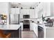 Stylish kitchen featuring white cabinets, stainless steel appliances, and sleek countertops at 625 Piedmont Ne Ave # 3029, Atlanta, GA 30308