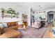 Inviting living room with a modern kitchen, comfortable seating, and ample natural light at 625 Piedmont Ne Ave # 3029, Atlanta, GA 30308