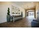 Lobby area with brick floors, gray sofa, accent lighting, and decorative planters at 625 Piedmont Ne Ave # 3029, Atlanta, GA 30308