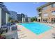 Beautiful community pool with comfortable seating, waterfall feature, and landscaped surroundings at 625 Piedmont Ne Ave # 3029, Atlanta, GA 30308