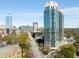 Stunning aerial view showcasing the high-rise apartment building and surrounding city skyline at 2795 Peachtree Rd # 1305, Atlanta, GA 30305