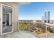 This balcony features a glass railing with expansive city views for outdoor enjoyment and relaxation at 2795 Peachtree Rd # 1305, Atlanta, GA 30305