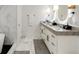 Modern bathroom featuring double vanity with marble countertops and sleek fixtures at 2795 Peachtree Rd # 1305, Atlanta, GA 30305