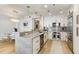 Contemporary kitchen features granite countertops, stainless steel appliances, and modern lighting fixtures at 2795 Peachtree Rd # 1305, Atlanta, GA 30305