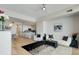 Open concept living room and dining room with modern furnishings and city views at 2795 Peachtree Rd # 1305, Atlanta, GA 30305