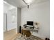 Bright office area with modern desk, natural light, and view of the kitchen space at 2795 Peachtree Rd # 1305, Atlanta, GA 30305