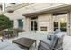 Comfortable outdoor patio featuring an outdoor fireplace and ample seating space for relaxation and entertaining at 2795 Peachtree Rd # 1305, Atlanta, GA 30305
