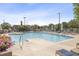 Outdoor pool surrounded by seating and lush landscaping at 2795 Peachtree Rd # 1305, Atlanta, GA 30305
