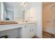 Well-lit bathroom featuring a vanity with storage and a shower with tub at 3403 Spring Harbour Drive Dr, Doraville, GA 30340