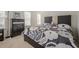 Inviting bedroom with a decorative bed and neutral decor, bathed in natural light at 3403 Spring Harbour Drive Dr, Doraville, GA 30340