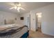 Spacious bedroom with neutral tones and natural light featuring an adjoining bathroom at 3403 Spring Harbour Drive Dr, Doraville, GA 30340