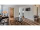 Cozy living room with wood floors, a comfortable leather sofa, and ample natural light at 3403 Spring Harbour Drive Dr, Doraville, GA 30340
